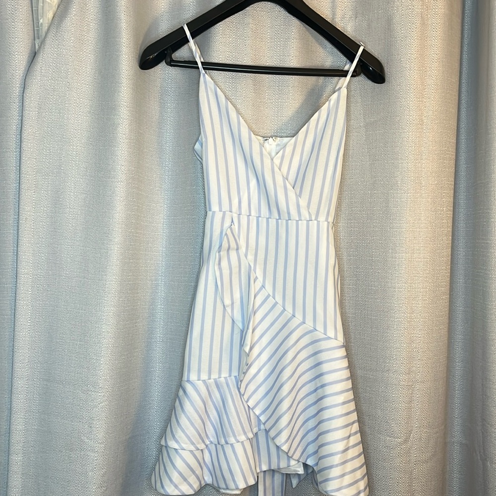 From “The Boutique” Size Small Striped white and blue dress
